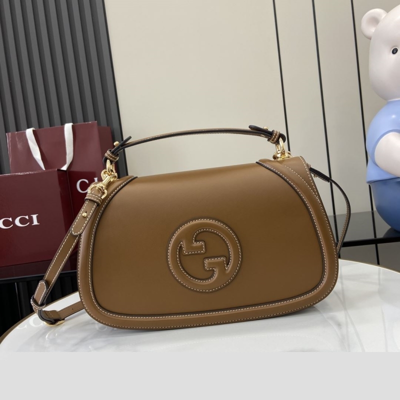 G*u*i top handle bags